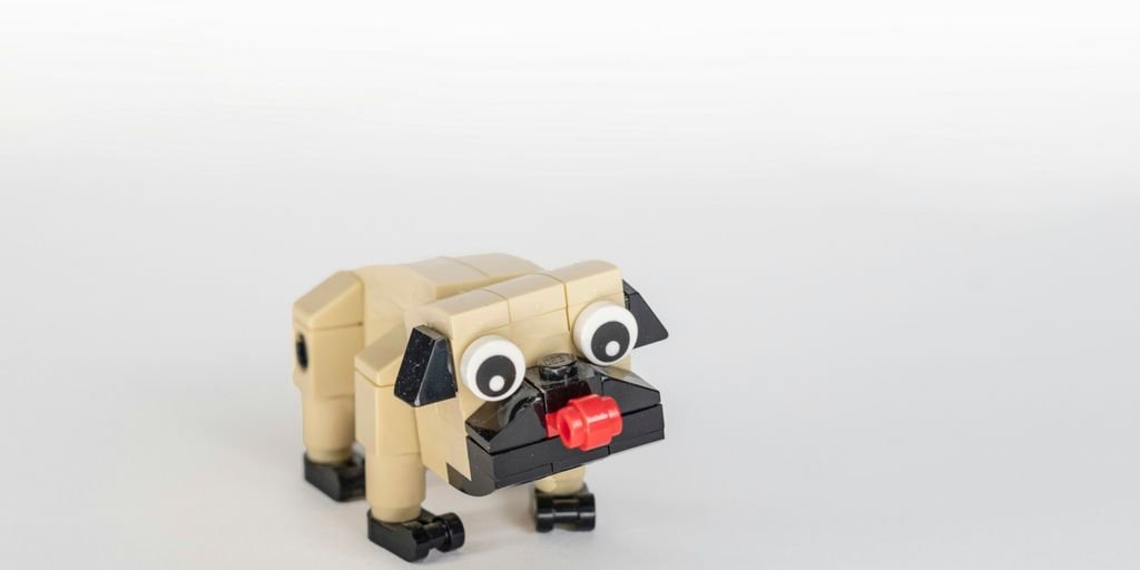 brown robot toy on white surface